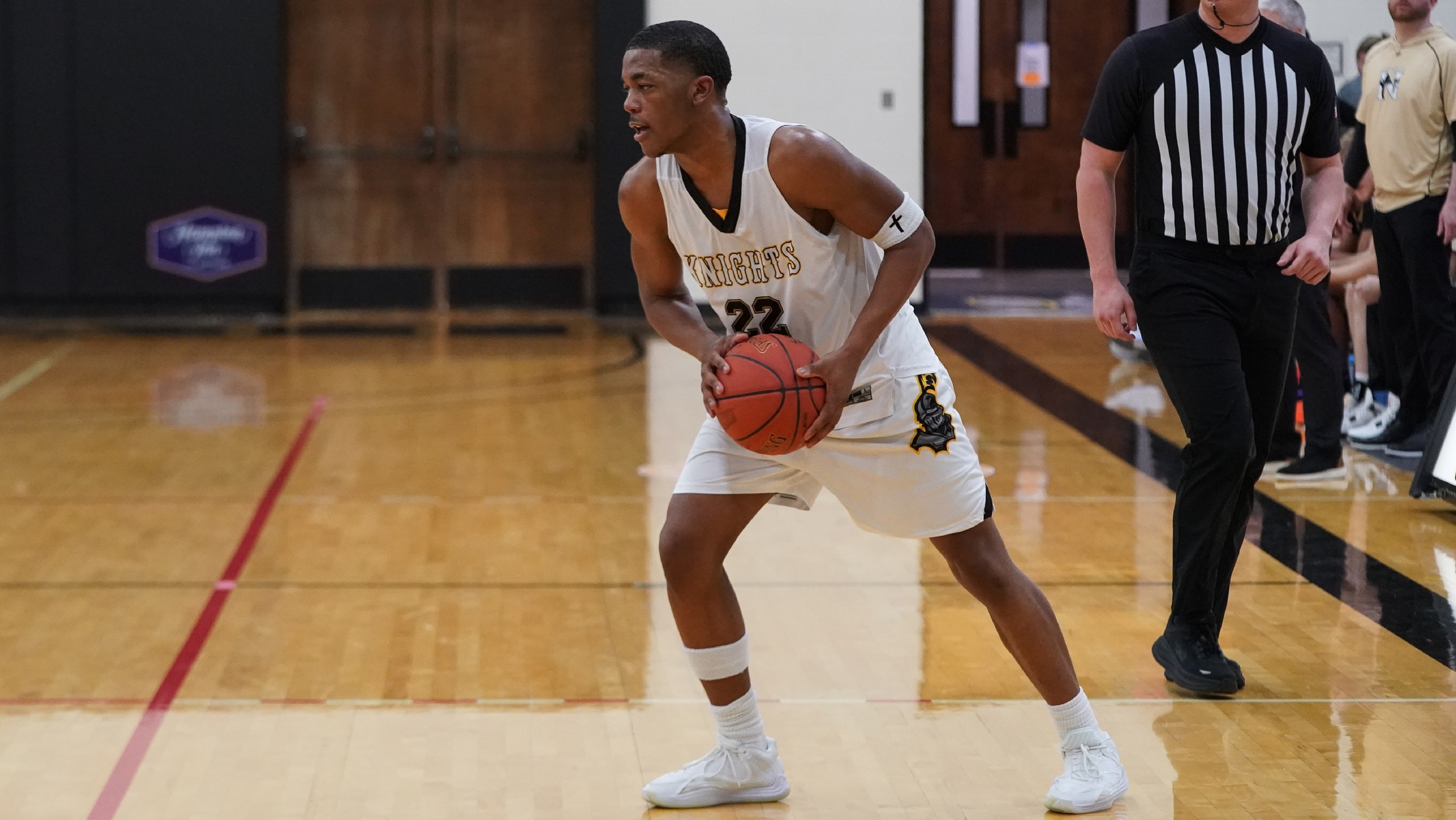 Michael propels Knights to win in regular season finale